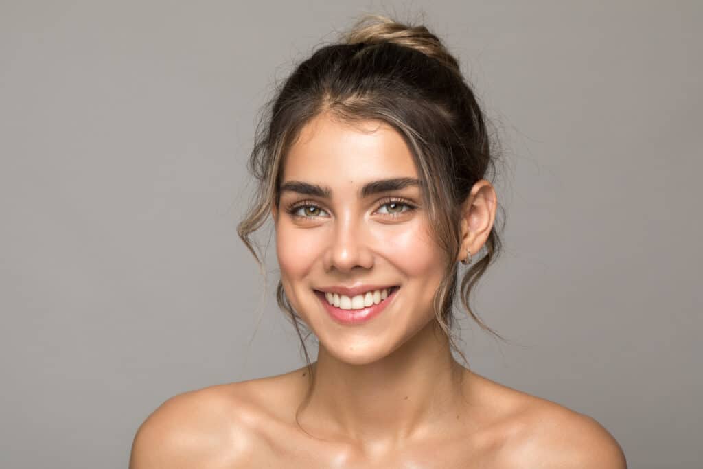 Woman with natural-looking dermal filler results.