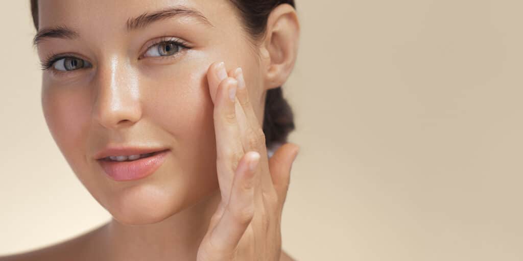 Woman with smooth skin after a Vampire Facial.